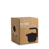 Brown cardboard box featuring black and white graphics of Clyde electric kettle and its cord.