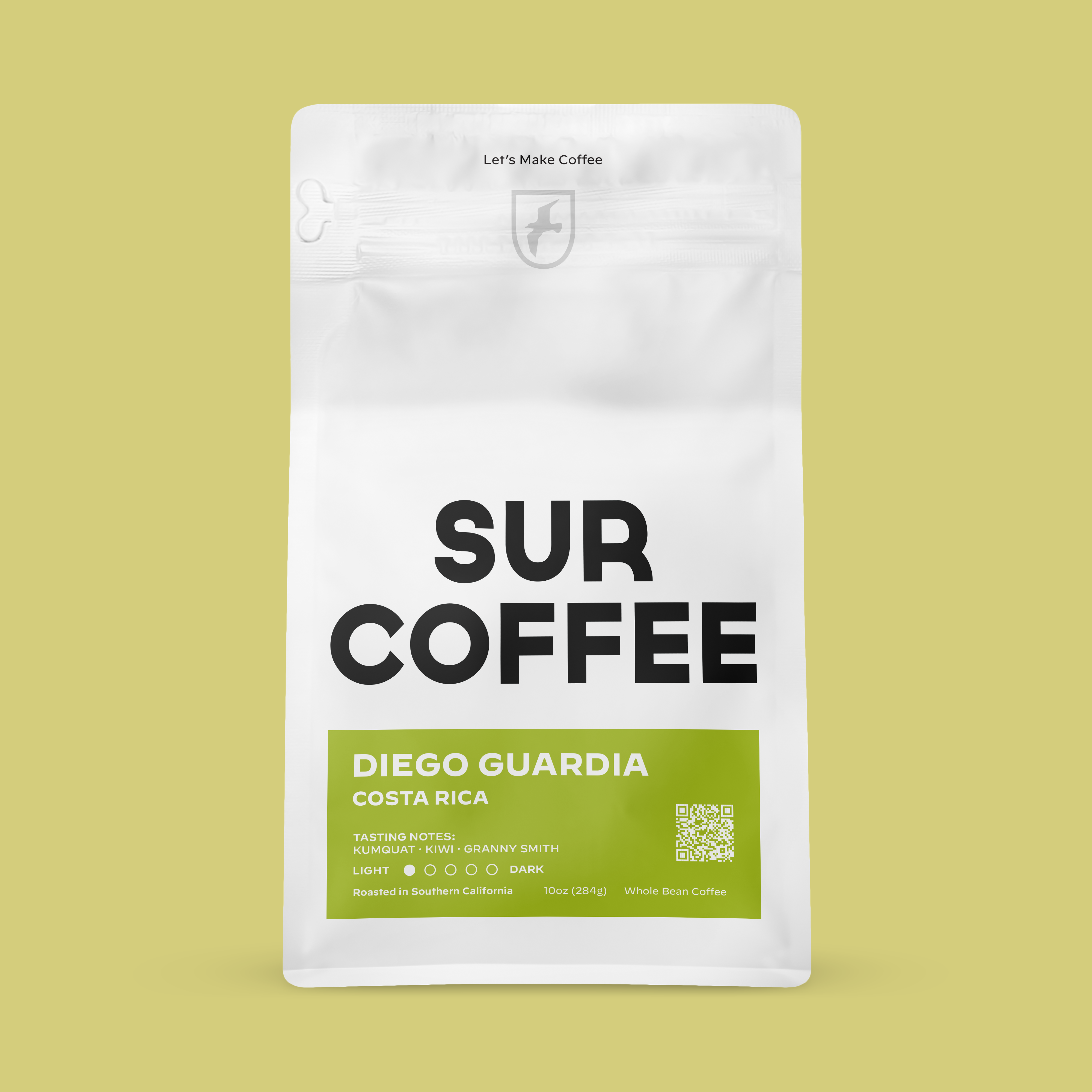 White resealable coffee bag with bold black "SUR COFFEE" text and green label reading "Diego Guardia Costa Rica".