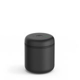 Matte black cylindrical electric vacuum canister with a smooth finish and compact design.