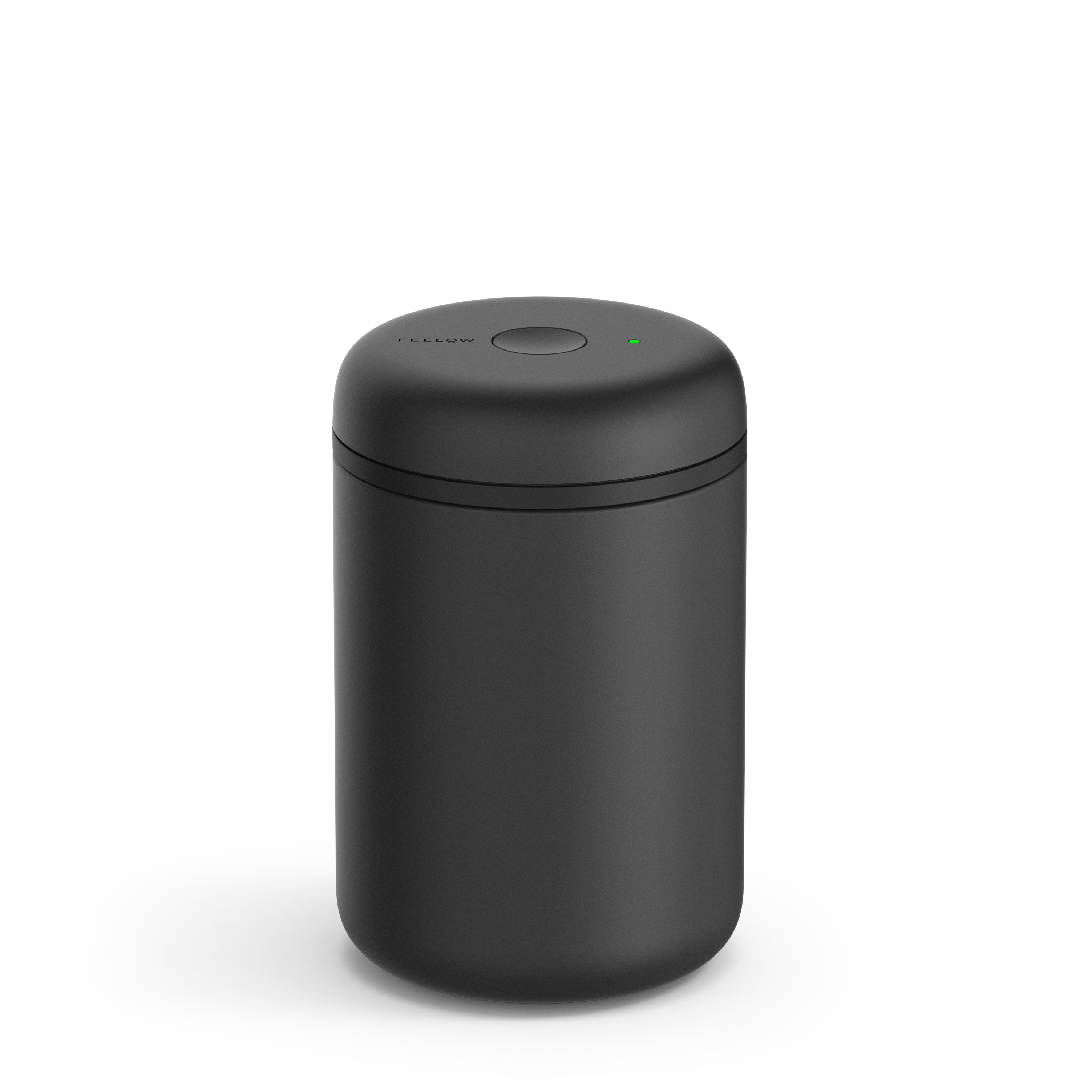Matte black cylindrical electric vacuum canister with smooth rounded lid and small status light on top.