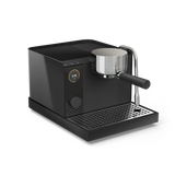 Matte black espresso machine with digital display, circular control dial, and metal portafilter on drip tray.