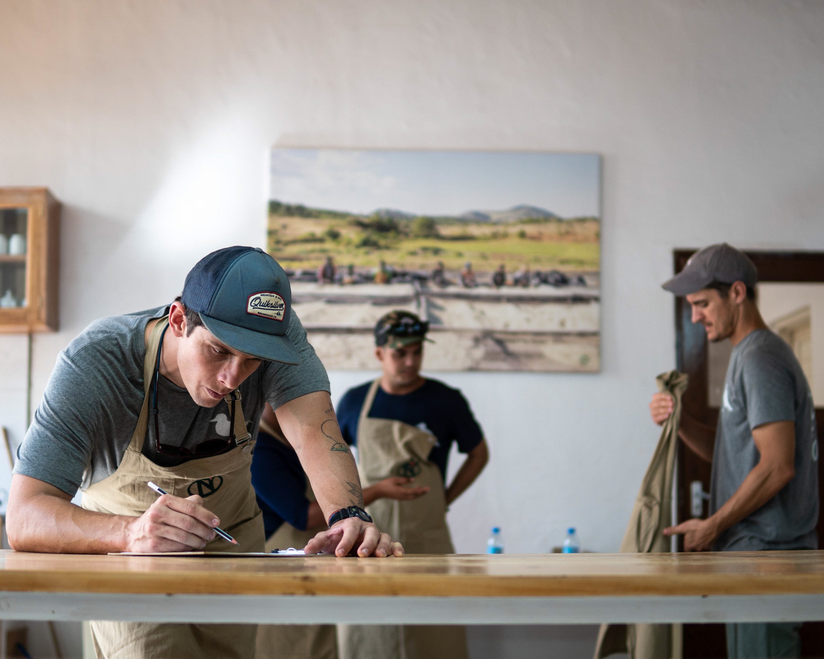 Roasters taking notes of coffee production