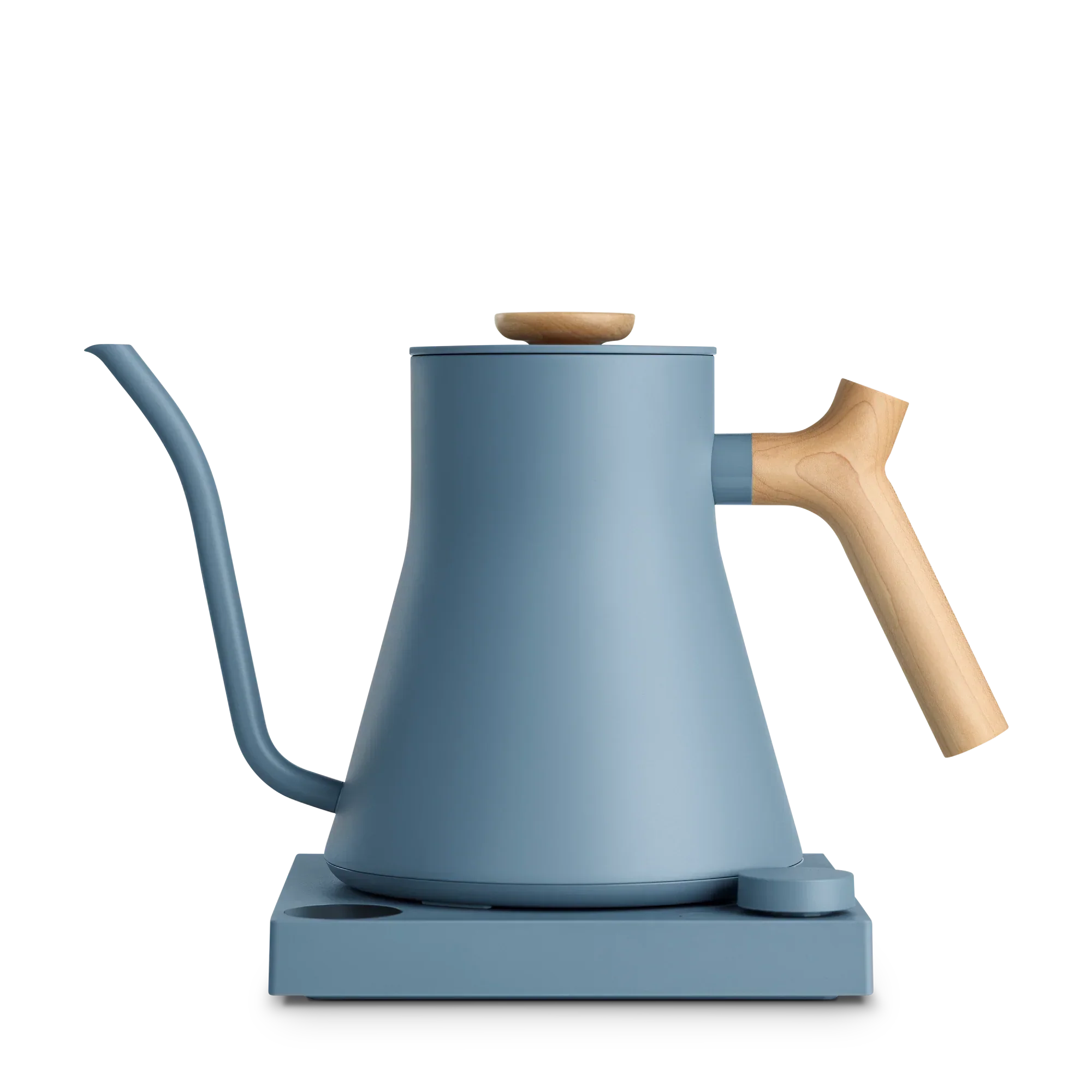 Matte blue electric kettle with wooden handle and lid knob, gooseneck spout, on matching blue base.