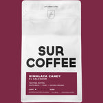 White resealable coffee bag with black "SUR COFFEE" text and maroon label detailing "Himalaya Candy El Salvador" blend.