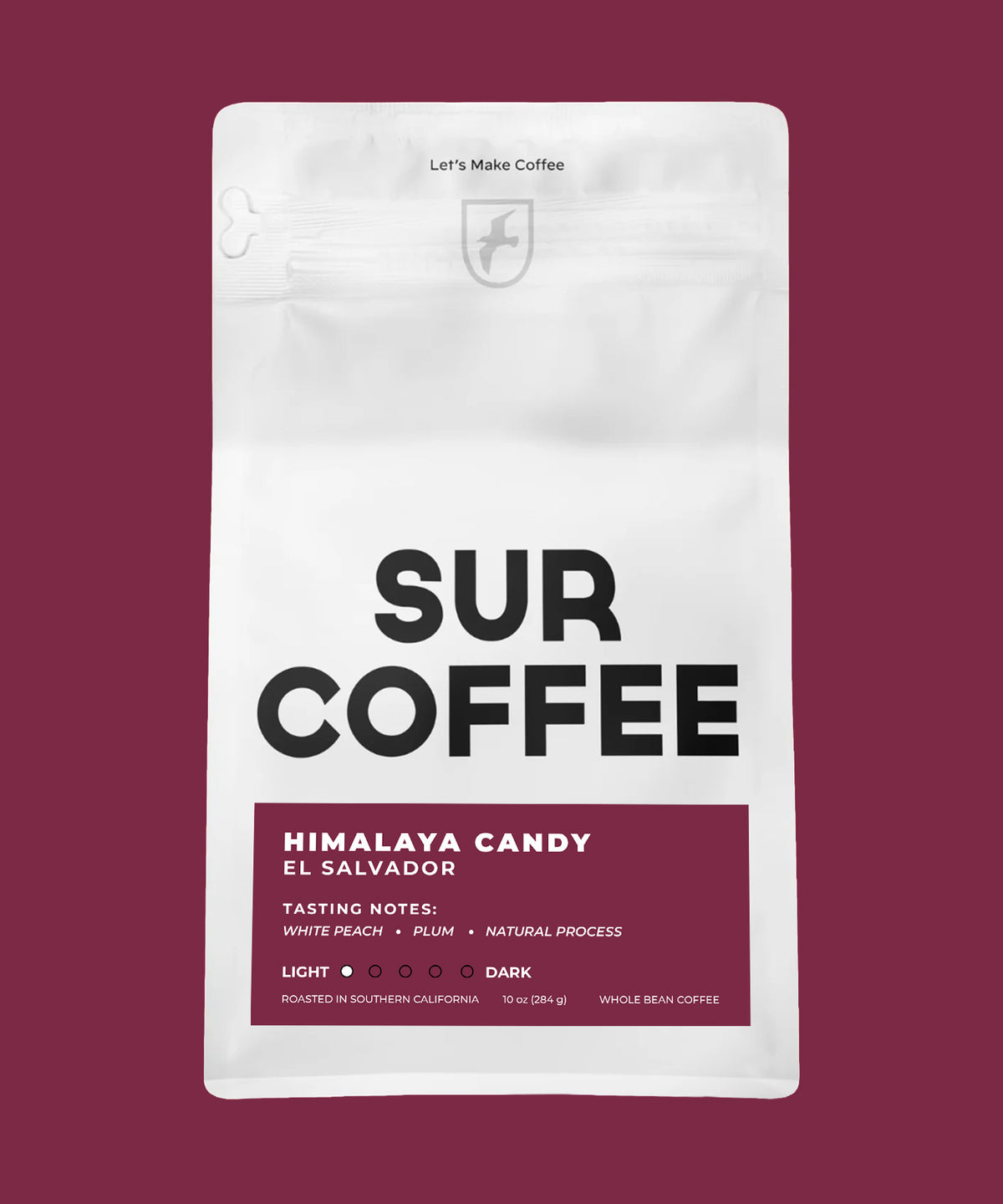 White resealable coffee bag with black "SUR COFFEE" text and maroon label detailing "Himalaya Candy El Salvador" blend.