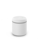 Compact white electric vacuum canister with smooth matte finish and single-button top control.