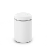 White cylindrical electric vacuum canister with smooth matte finish and gray sealing ring near the top.