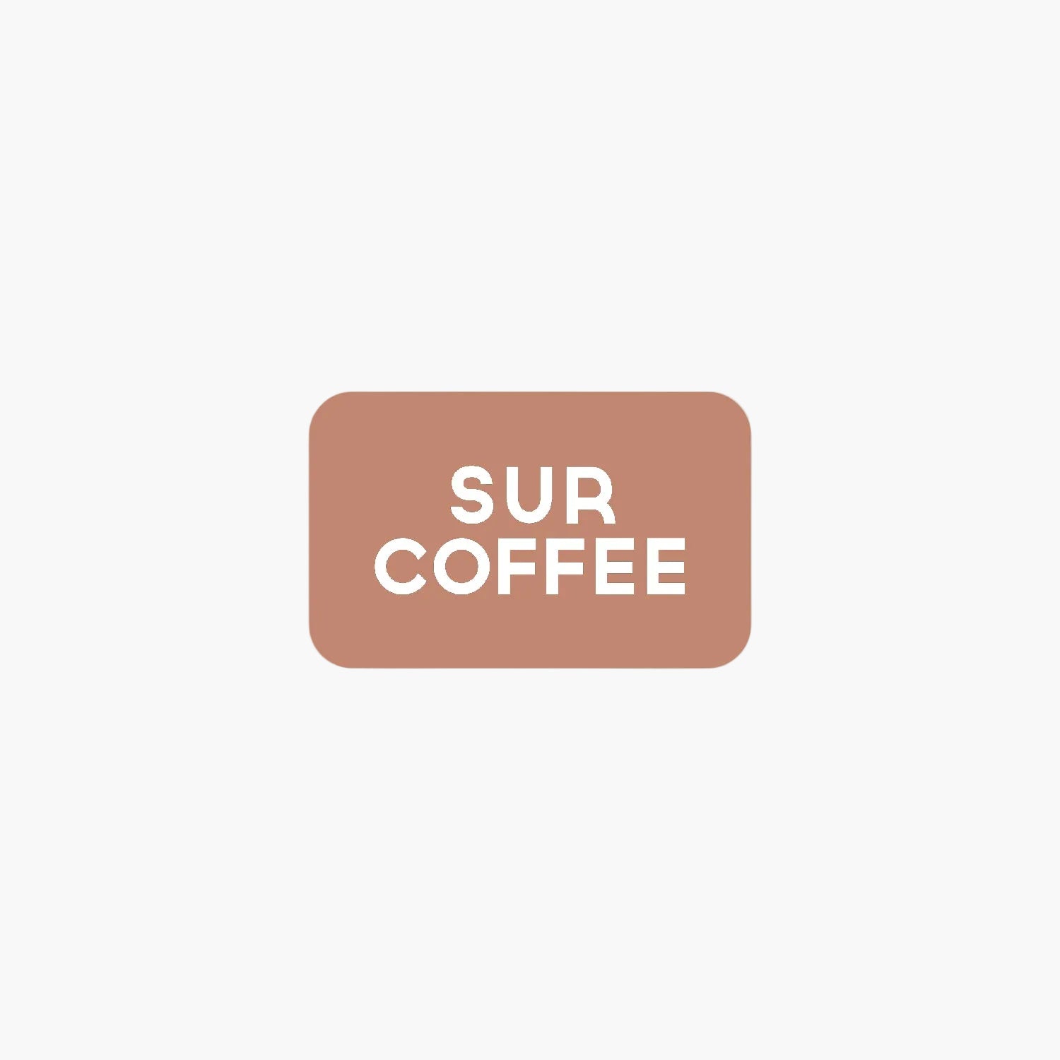 Rectangular brown gift card with white bold text reading "SUR COFFEE" centered on it.